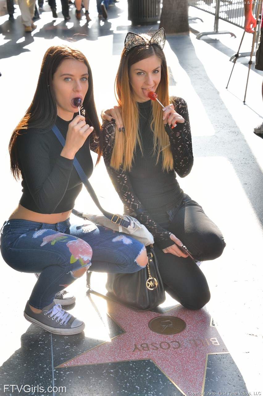 Cuties Lana Rhoades and Stella Cox strip, pose and masturbate with a dildo   
